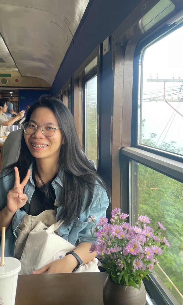 a person sitting in a train
