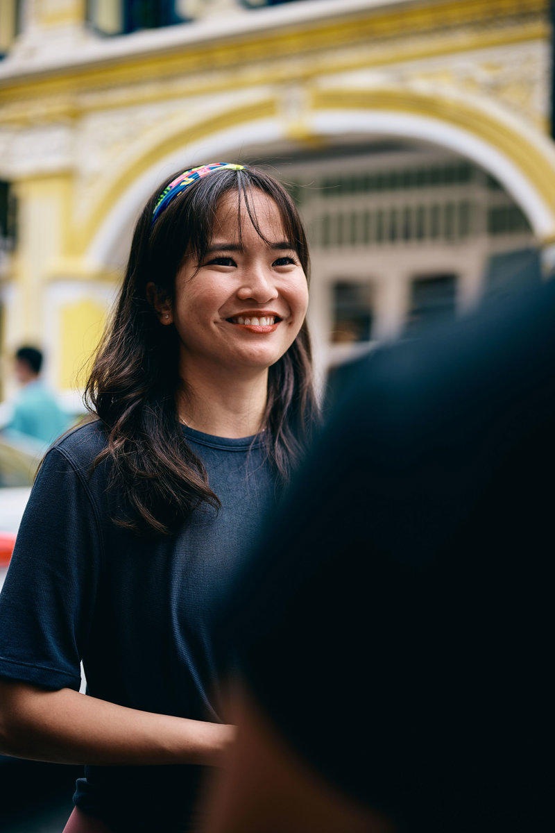 a woman smiling at someone