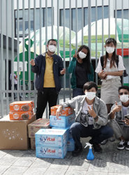 a group of people wearing face masks
