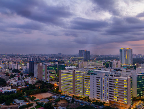 a city with many buildings and trees