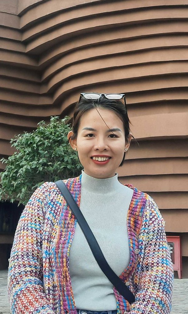 a person standing in front of a building