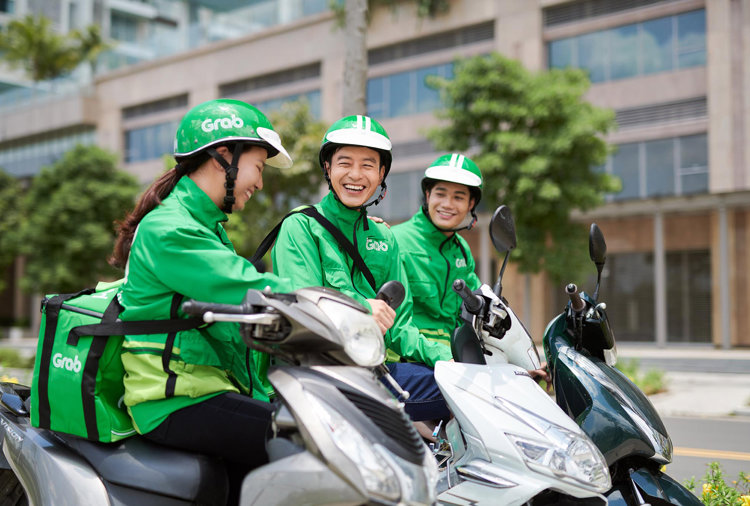 a group of people on scooters