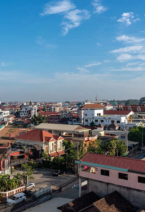 a city with many buildings and trees