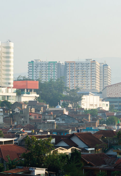 a city with many buildings and trees