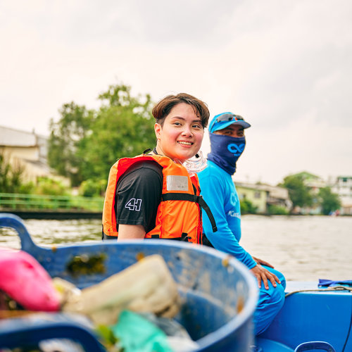 a man and woman on a boat