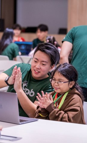 a group of people clapping hands