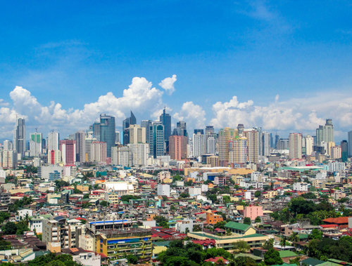 a city with many buildings and trees