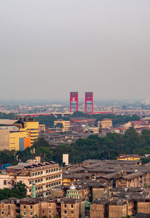 a city with many buildings and trees