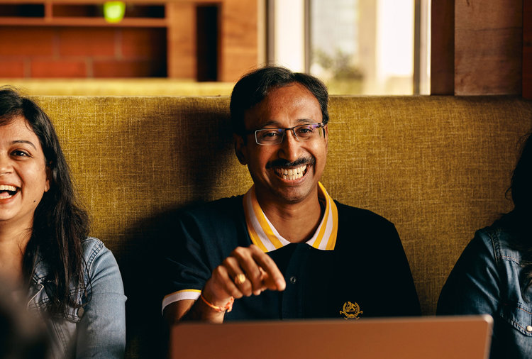 a group of people sitting at a table