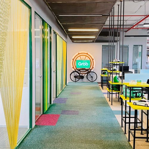 a room with a bike and tables