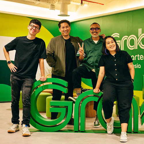 a group of people posing for a photo