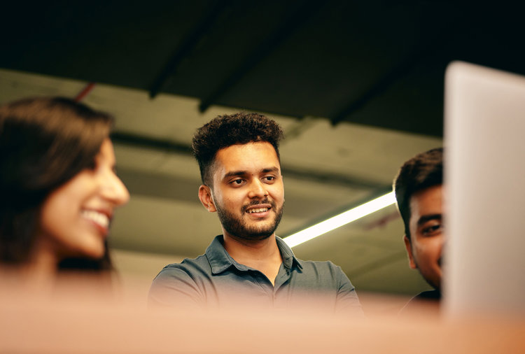 a group of people looking at each other