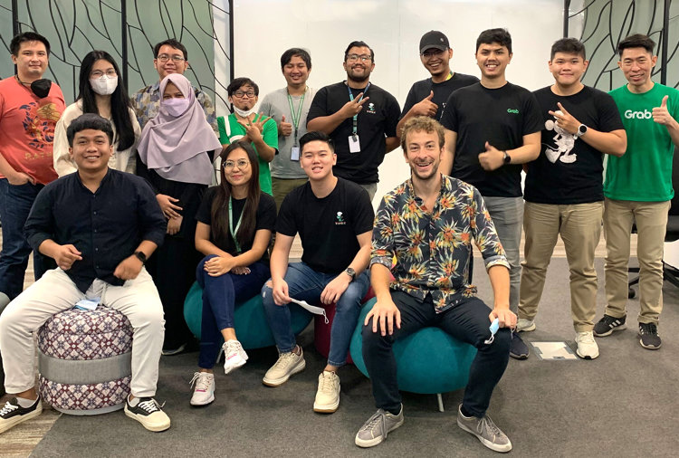 a group of people posing for a photo