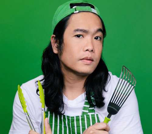 a man holding a kitchen utensil