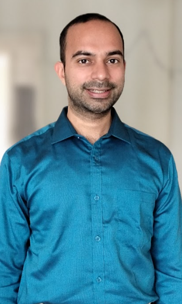 a man in a blue shirt