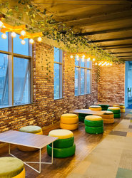 a room with tables and chairs